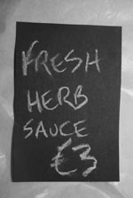 Fresh herb sauce on board